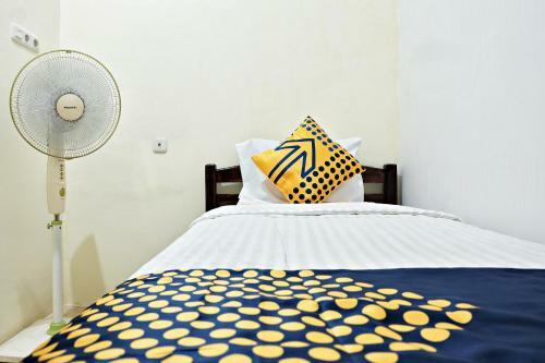 Hotel Spot On 2742 R5 Homestay