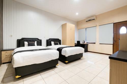 Hotel Oyo 2469 Sutomo Homestay