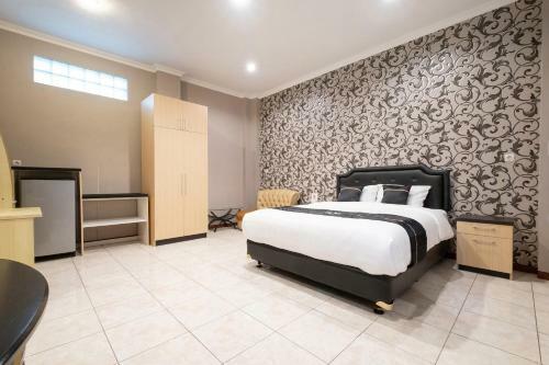 Hotel Oyo 2469 Sutomo Homestay