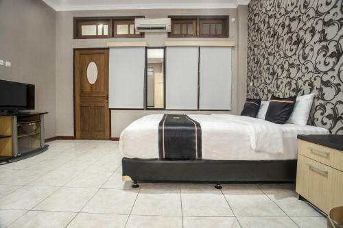 Hotel Oyo 2469 Sutomo Homestay