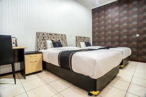 Hotel Oyo 2469 Sutomo Homestay