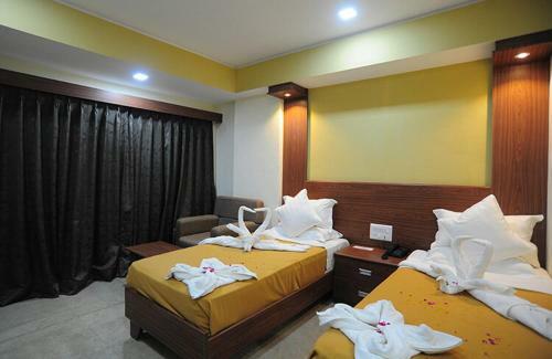 Hotel Pride Biznotel - The Maison Anand