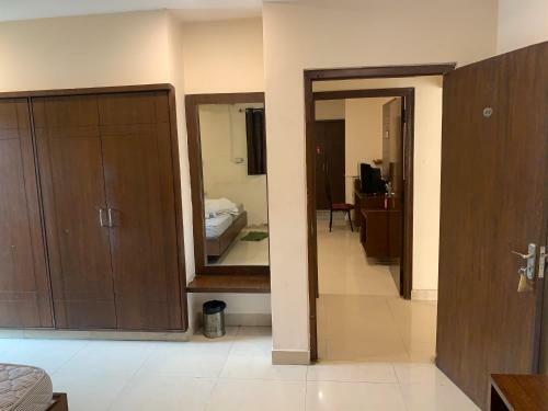 Hotel Rooms Near Aig Hospital