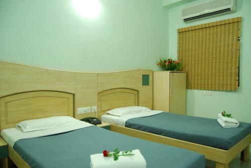 Hotel Vinayaga Excellency By Poppys Tirupur