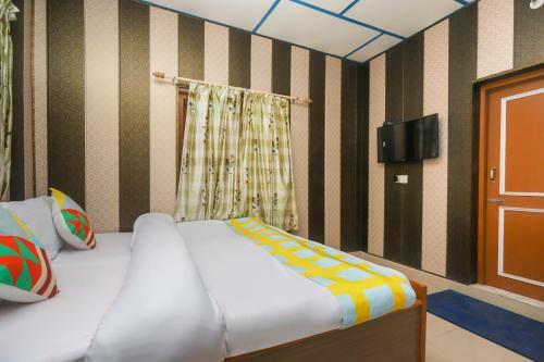 Hostal Oyo 78306 Sunshine Homestay