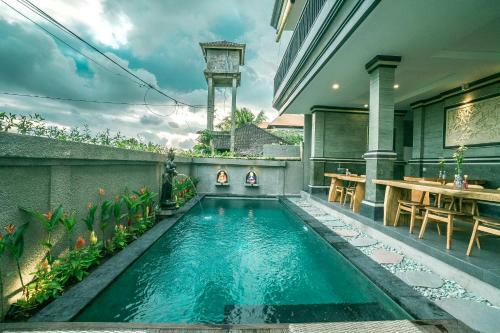 Hostal Three Dewi's Guest House