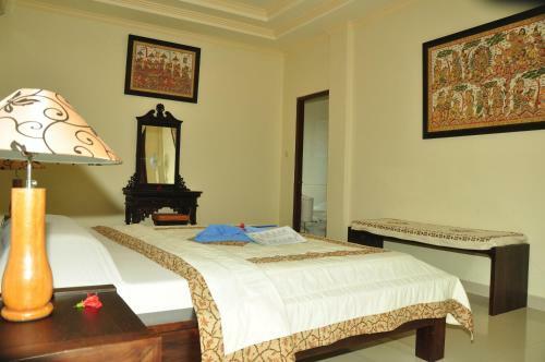 Hostal Three Dewi's Guest House