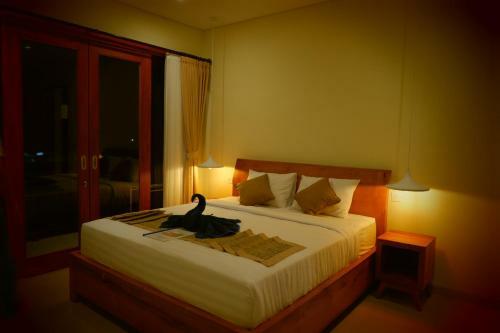 Hostal Three Dewi's Guest House