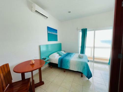 Habitaci�n Amanecer Turquesa #5 Priest House