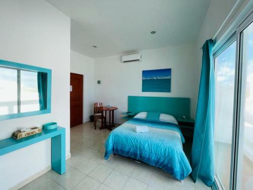Habitaci�n Amanecer Turquesa #5 Priest House