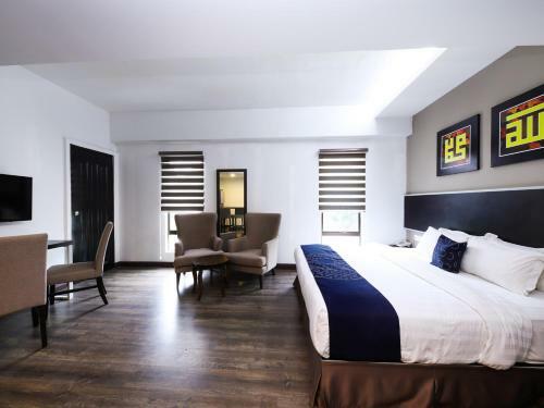 Capital O 978 Midaris Hotel