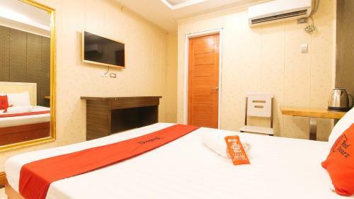 Hotel Reddoorz Plus @ Winter Benitez Cubao