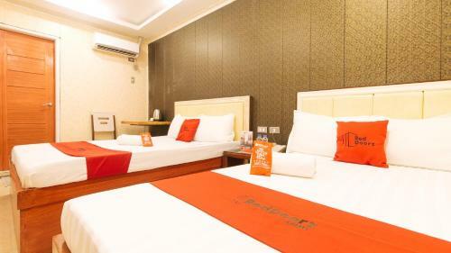 Hotel Reddoorz Plus @ Winter Benitez Cubao