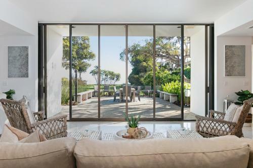 New Listing! Palatial Beachfront Estate With Casita Home
