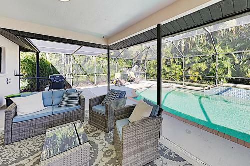 New Listing! Sparkling Home With Caged Pool & Lanai Home