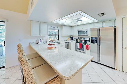 New Listing! Sparkling Home With Caged Pool & Lanai Home