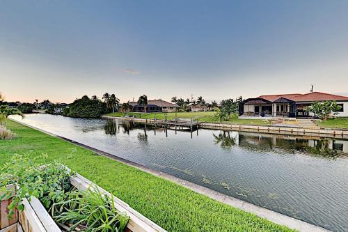 Lavish Canal-front Getaway With Heated Pool & Dock Home
