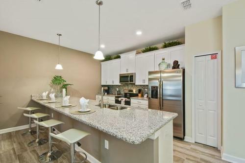 Modern 4 Bed 3 Bath Townhome In Championsgate Golf Resort