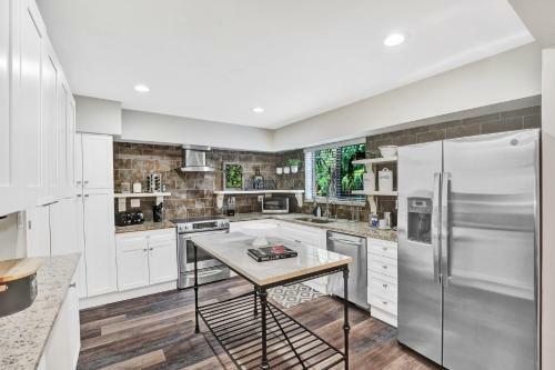 Trendy Renovated 4 Br Home W/ Heated Pool