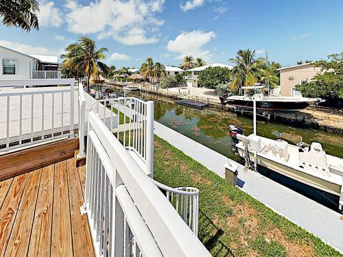 New Listing! Canal-front Retreat With Dock, Balcony Home