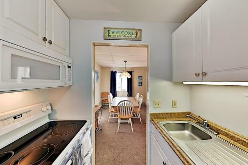 Apartamento Bayside Getaway With Pool - Walk To Beach & Dining Condo