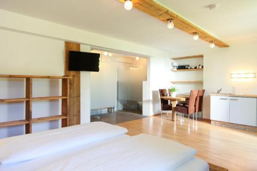 Hostal Gasthof Pension Wei�es R�ssl