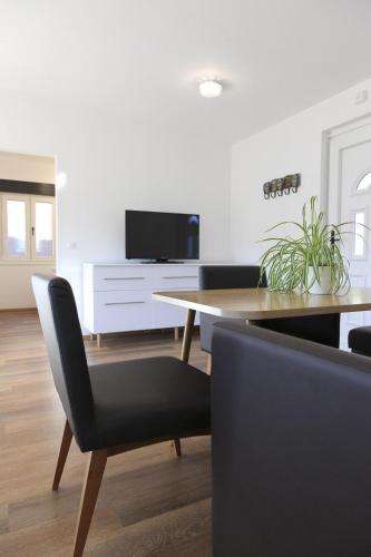 Hostal Gasthof Pension Wei�es R�ssl