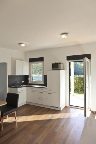 Hostal Gasthof Pension Wei�es R�ssl