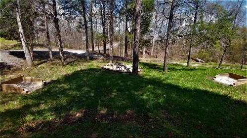 Free Xplorie Attractions Every Day! - Driftwood Log Cabin