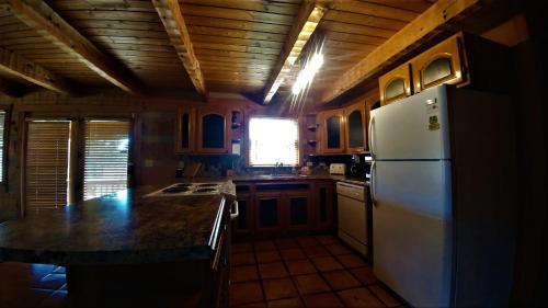 Free Xplorie Attractions Every Day! - Driftwood Log Cabin