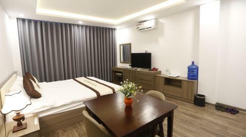 V Apartment & Hotel