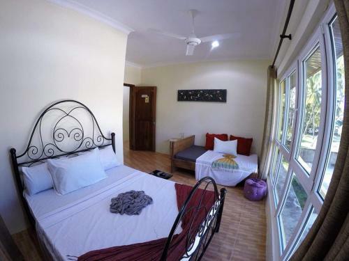Hostal Bwejuu Beach Palm Villa