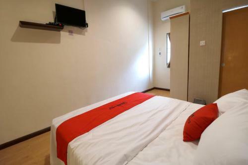 Hostal Reddoorz Plus Near Universitas Sumatera Utara