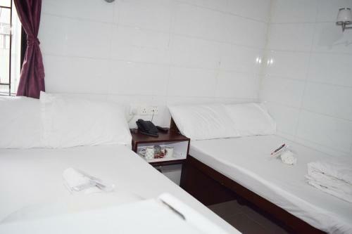 Hostal Pay-less Guesthouse