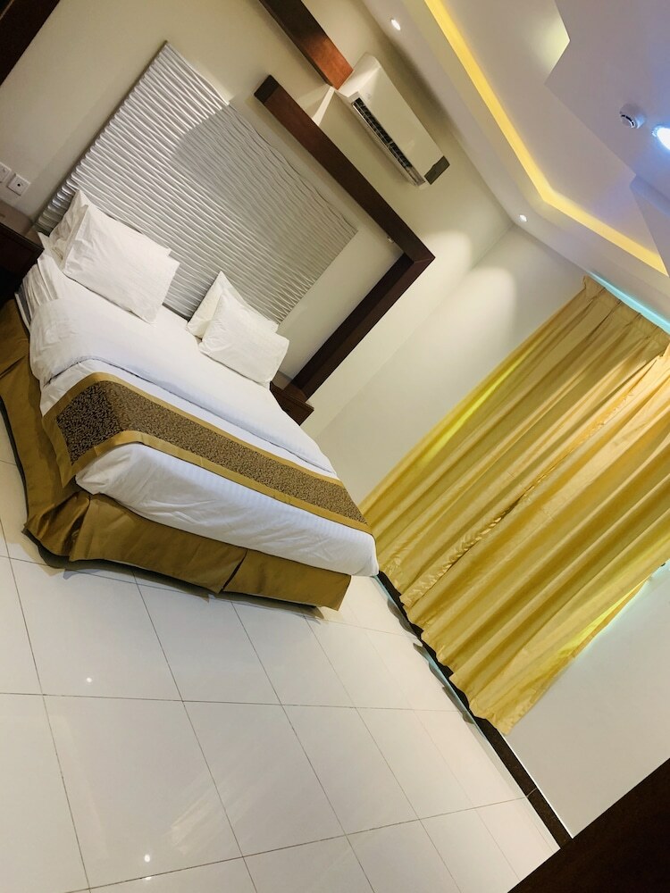 Apartamento Tooq Suites