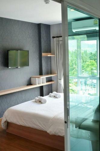 Apartamento The Seacondo (Room For Holiday)