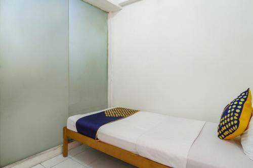 Hotel Spot On 90894 Icarus Home Syariah