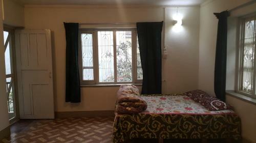 Hostal Laughing Buddha Hotel & Garden Theater