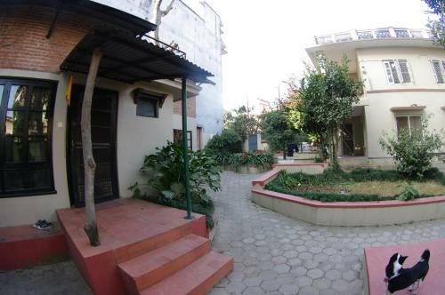 Hostal Laughing Buddha Hotel & Garden Theater