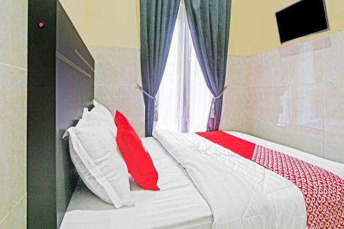 Hotel Oyo 90737 Losmen Aini Syariah