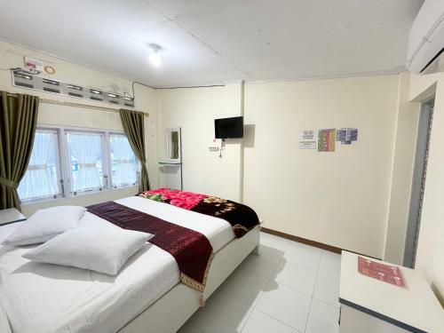 Hostal Rumah Umi Awr
