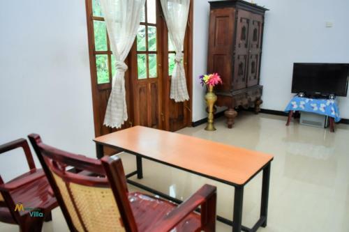 Minimuthu Villa