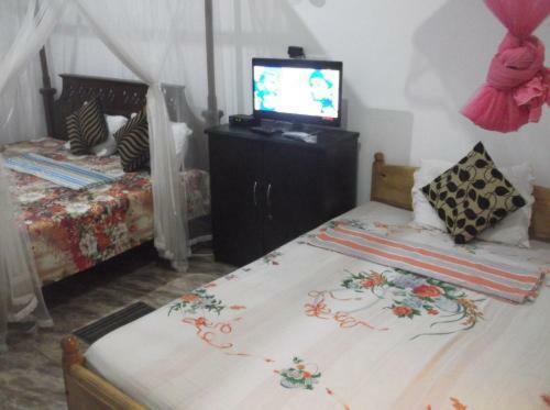 Hostal White Flower Gust Hose In Unawatuna