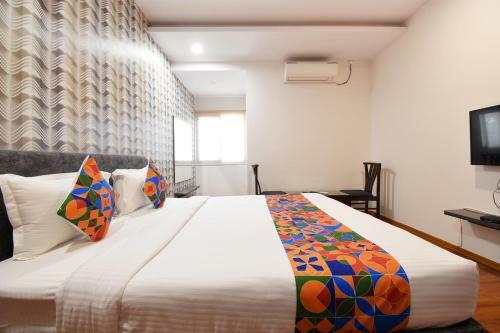 Fabhotel Dhanvitha Suites
