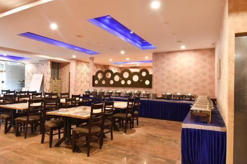 Fabhotel Dhanvitha Suites