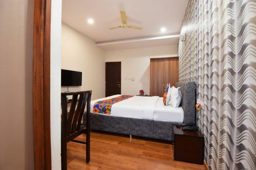 Fabhotel Dhanvitha Suites