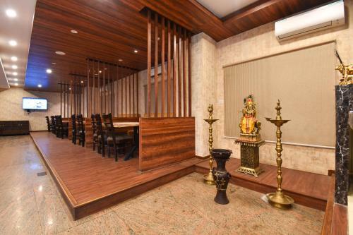 Fabhotel Dhanvitha Suites