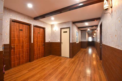 Fabhotel Dhanvitha Suites