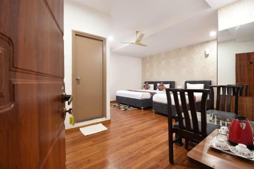 Fabhotel Dhanvitha Suites