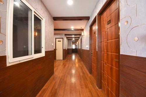 Fabhotel Dhanvitha Suites